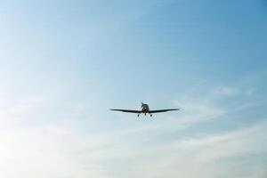 Single engine ultralight aircraft flying in the sky. empty space for insertion. photo