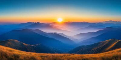 Breathtaking sunrise over rolling mountains, showcasing vibrant colors and serene landscapes. soft light illuminates valleys, creating peaceful atmosphere photo