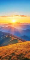 breathtaking landscape showcasing rolling hills and mountains at sunset, with vibrant colors illuminating sky and creating serene atmosphere photo