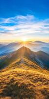 Breathtaking mountain landscape at sunrise, showcasing golden grass and distant peaks under vibrant blue sky. serene and peaceful atmosphere invites exploration photo