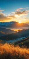 breathtaking sunrise over mountains, casting golden rays on lush valleys and misty landscapes. vibrant colors of nature evoke sense of tranquility and awe photo