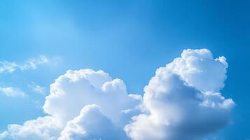 Fluffy white clouds against bright blue sky create serene atmosphere. soft shapes and vibrant colors evoke sense of calm and tranquility photo