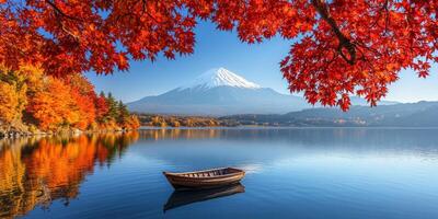 serene landscape featuring Mount Fuji surrounded by vibrant autumn foliage, reflecting in calm waters with small boat in foreground photo