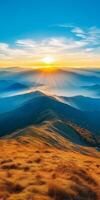 Breathtaking sunrise over rolling mountains, with golden grass and misty valleys. vibrant colors create serene and peaceful atmosphere, perfect for nature lovers photo