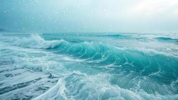 Blue Ocean Waves with White Foam and Snowfall photo