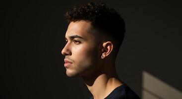 Profile of a contemplative young man with curly hair and undercut - Generated using AI photo