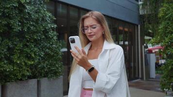 Woman checking smartphone with deep sense of loss, woman realizing unexpected defeat, loss reflected in anxious gestures, excellent footage for showcasing emotional letdowns in modern life. video
