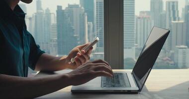 Man discussing project via phone in lofty studio, project requiring timely updates and synergy, project reflecting agile workflow, perfect for remote collaboration or fast-paced deadlines. video