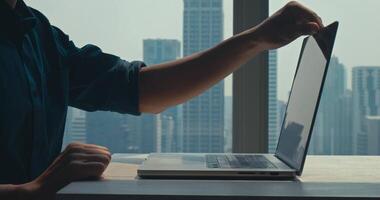 Employee begins remote tasks with stunning view, employee demonstrating efficiency and dedication, employee embracing flexible schedule, highly relevant for corporate culture footage. video