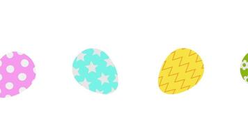 looped animation with rolling colorful flat easter eggs on white background video