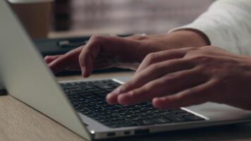 Unrecognizable Caucasian businessman worker boss male guy typing keyboard laptop in office employer man working using gadget Internet hands close up programmer develop executive digital tech business video