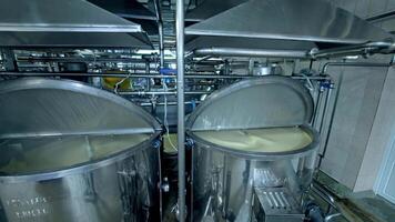 Factory for production of butter. Production of butter at milk production factory video