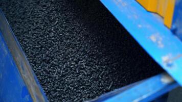 Compressed pellets for use as an eco-friendly renewable. Close up on a pile of compressed pellets for use as an eco-friendly renewable video
