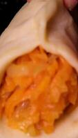 the process of making pies with cabbage, pumpkin and carrots video