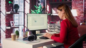 Freelancer typing commands into a futuristic AI chatbot to help solve tasks, artificial intelligence demonstrates the power of automation and virtual assistance for efficiency. Camera B. video