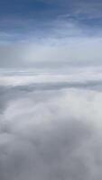 Soaring High Vertical Airplane Window View of Blue Sky video