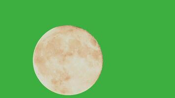 Stunning full moon rises through clouds in a cinematic time lapse showcasing the beauty of the night sky, green screen chromakey footage video