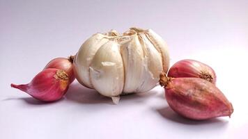 Garlic and Shallots. An important ingredient in cooking. Top view isolated white background photo