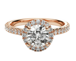 deslumbrante diamante noivado anel apresentando volta Centro pedra cercado de menor diamantes, conjunto dentro rosa ouro banda. perfeito para simbolizando amor e comprometimento png