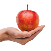 A Fresh Red Apple Held Gently in a Man's Hand Against a White Background png