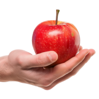 A perfectly ripe red apple held gently in a man's hand against a blurred background png