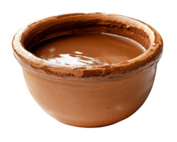 A brown clay pot with a brown liquid in it png