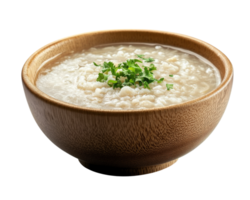 bowl of congee garnished with fresh herbs in wooden bowl, isolated on transparency background. creamy texture and simple presentation evoke sense of comfort and warmth png