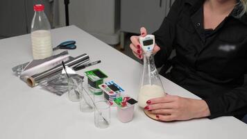 Scientist testing dairy products in laboratory video