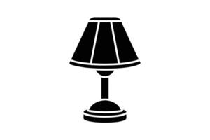 A simple black and white desk lamp icon vector