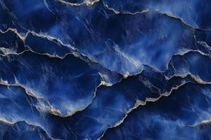 A blue marble texture with gold and black lines photo