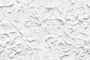 A white wall with paint splatters photo