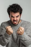 Angry man with angry expression on his face photo