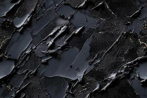 A black and gold paint texture with cracks photo