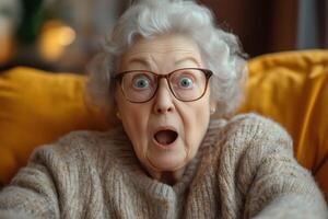 An older woman with glasses is looking surprised photo