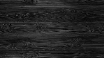Black wooden planks with a smooth texture and visible grain patterns. The wood has a polished finish, creating a sleek and modern appearance. photo