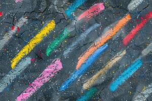 A painting of colorful paint on a wall photo