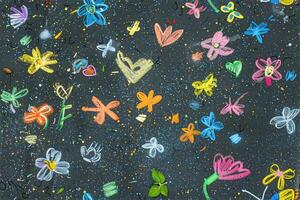 A colorful drawing of flowers and butterflies on a black background photo
