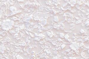 A close up of a white floral pattern photo