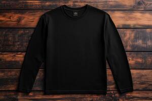 Black long sleeve tee mockup on wooden background photo