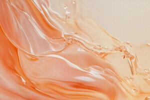 A close up of a liquid with orange and pink colors photo