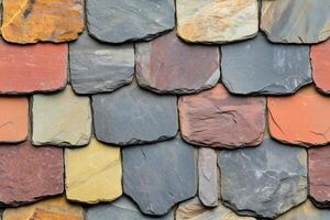 A close up of a stone roof with many different colors photo