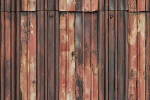 Seamless rusty, weathered corrugated metal sheet with vertical ridges. photo