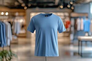 Blue t - shirt mockup on a mannequin in a clothing store photo