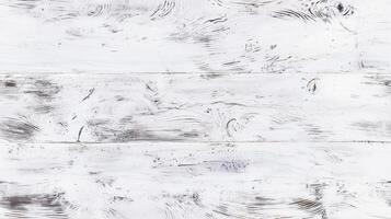 A textured white wooden surface with visible grain patterns and knots, creating a rustic and weathered appearance. photo