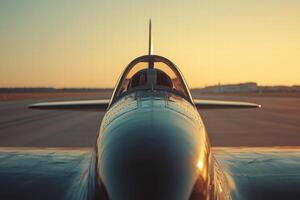 A close up of a jet airplane on the runway photo