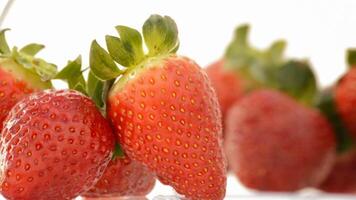 Fresh strawberries rotating, loop video