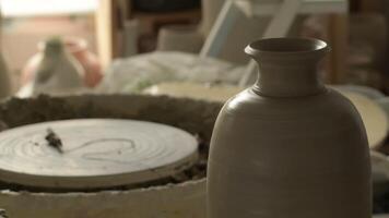 New piece vase of mud recently made by a potter spinning in the lathe video