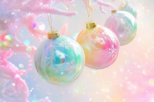 Colorful Christmas ornaments hanging on a tree, featuring pastel shades of pink, blue, and white with delicate snowflake designs. The background is softly blurred with a dreamy bokeh effect. photo