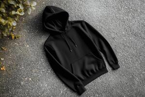 Black hoodie mockup on concrete photo