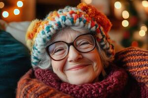 An older woman wearing glasses and a knitted hat photo